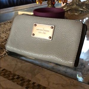 Michael kors gray leather wallet.